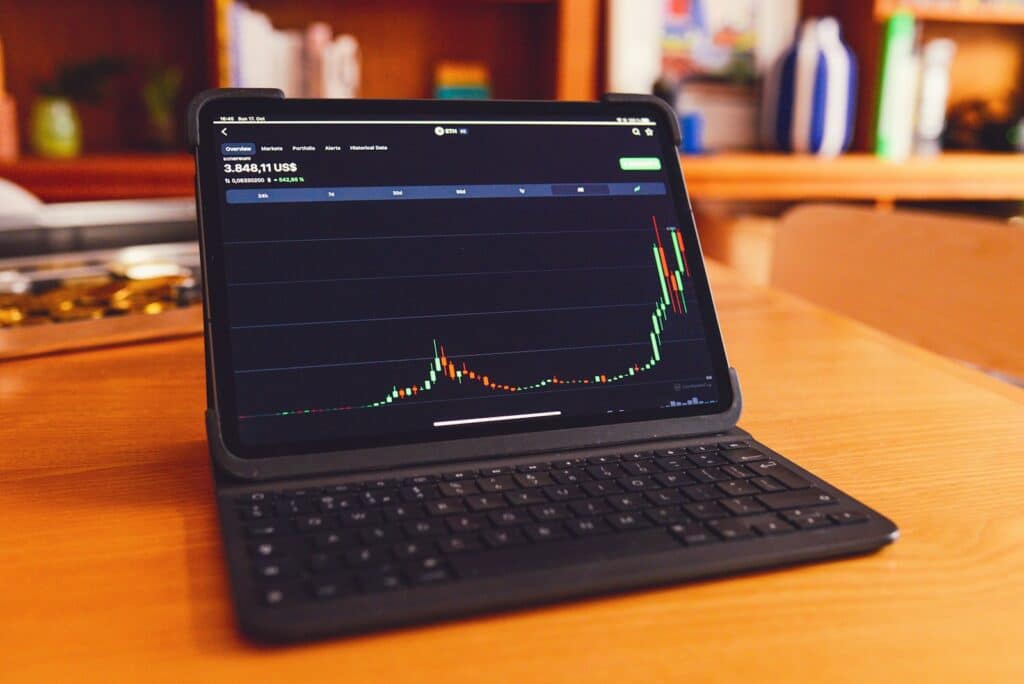 How to Calculate Profit: A Simple Guide for Small Business Owners 4 a laptop computer sitting on top of a wooden desk